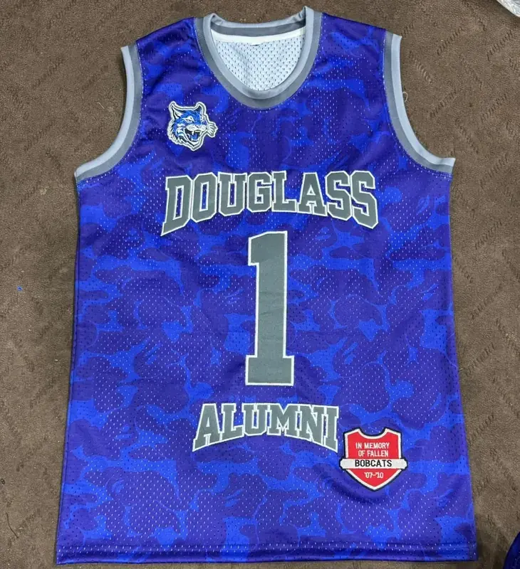 Custom sublimated royal-blue alumni basketball jersey, front, flat lay