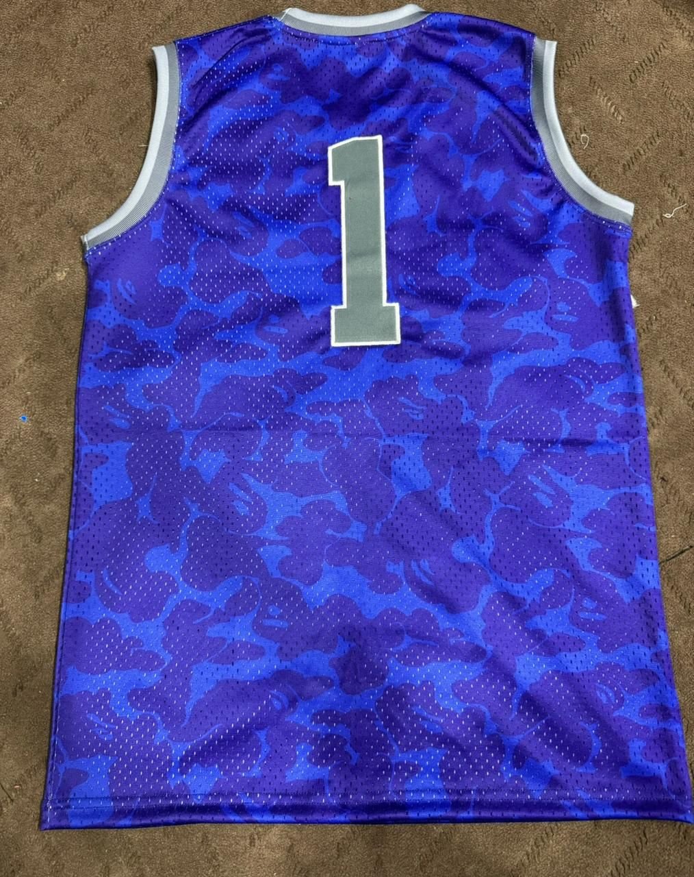 Custom alumni basketball jersey, back, flat lay