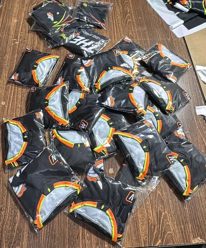 Finished bulk order of custom shorts, ready to pack