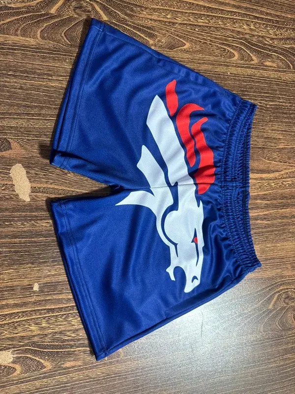 Custom team shorts with logo branding, real finished production