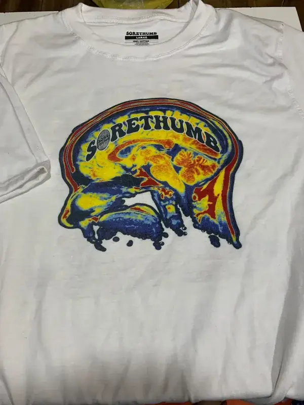 Custom screen-printed graphic t-shirt, white colorway, colourful brain illustration print, "Sore Thumb" brand