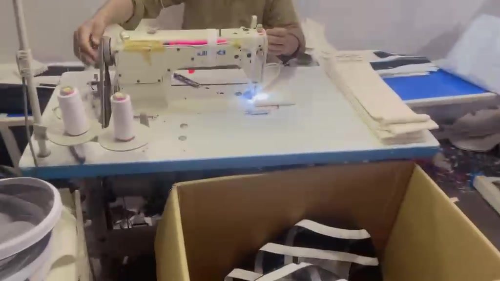 Close-up of stitching line at a sportswear and uniform manufacturing factory